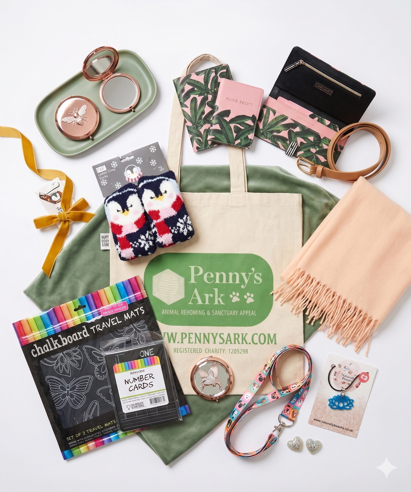 Items donated to the Penny's Ark Pennies Auction: a tote bag, scarves, jewellery, chalkboard mats, lanyards, earrings and more, laid out flat.